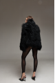 Women's black sheepskin coat made of natural llama